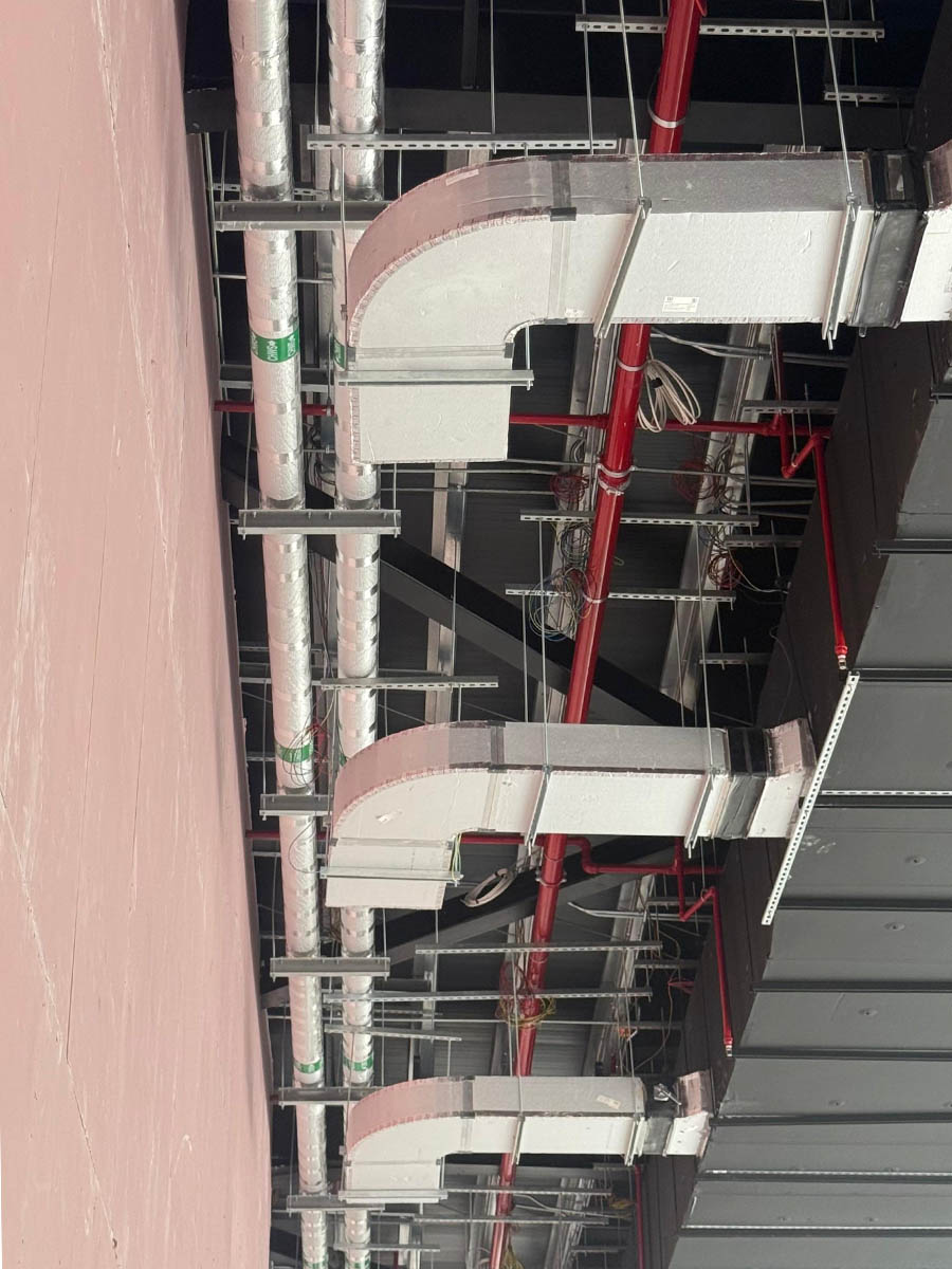 Ducted HVAC installation above a commercial ceiling void